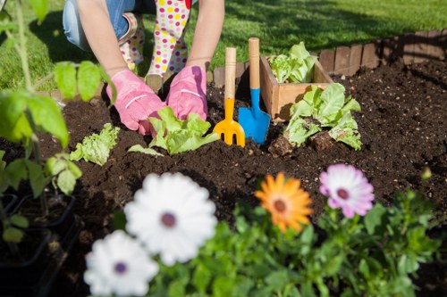 Expert gardeners maintaining a lush garden
